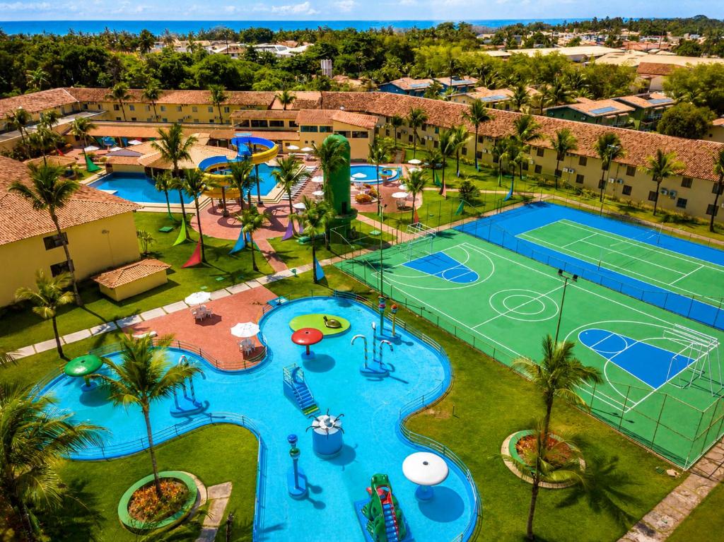 an aerial view of a tennis court at a resort at Portobello Park Hotel in Porto Seguro