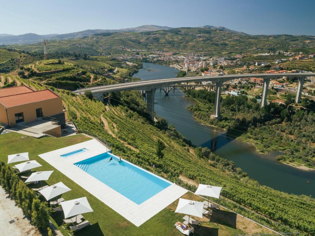 an aerial view of a bridge over a river at Quinta do Roso - Douro Wine Estate - by FERO in Lamego