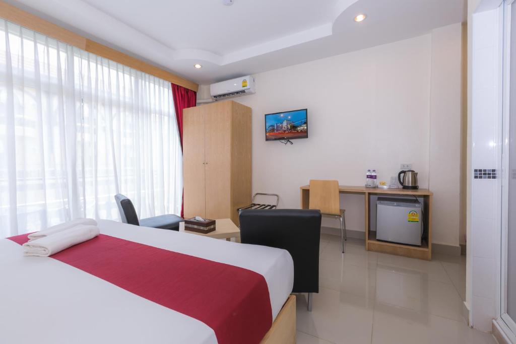 Postel nebo postele na pokoji v ubytování Zing Resort & Spa