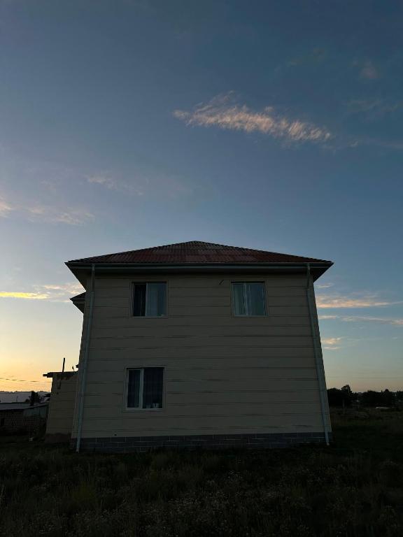 a house in the middle of a field at Уметалиев Канат in Birlik