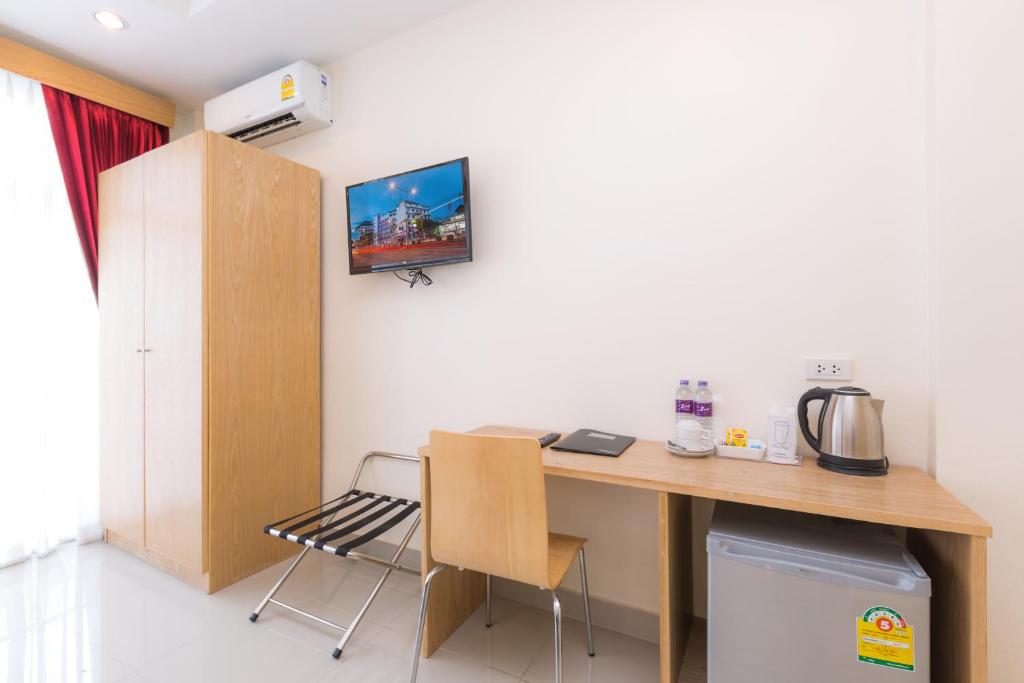 TV a/nebo společenská místnost v ubytování Zing Resort & Spa