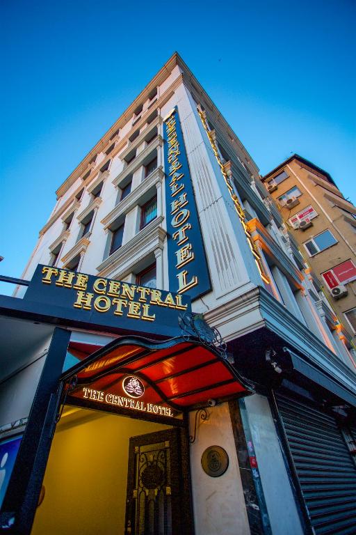 a hotel sign on the front of a building at The Central Hotel in Istanbul