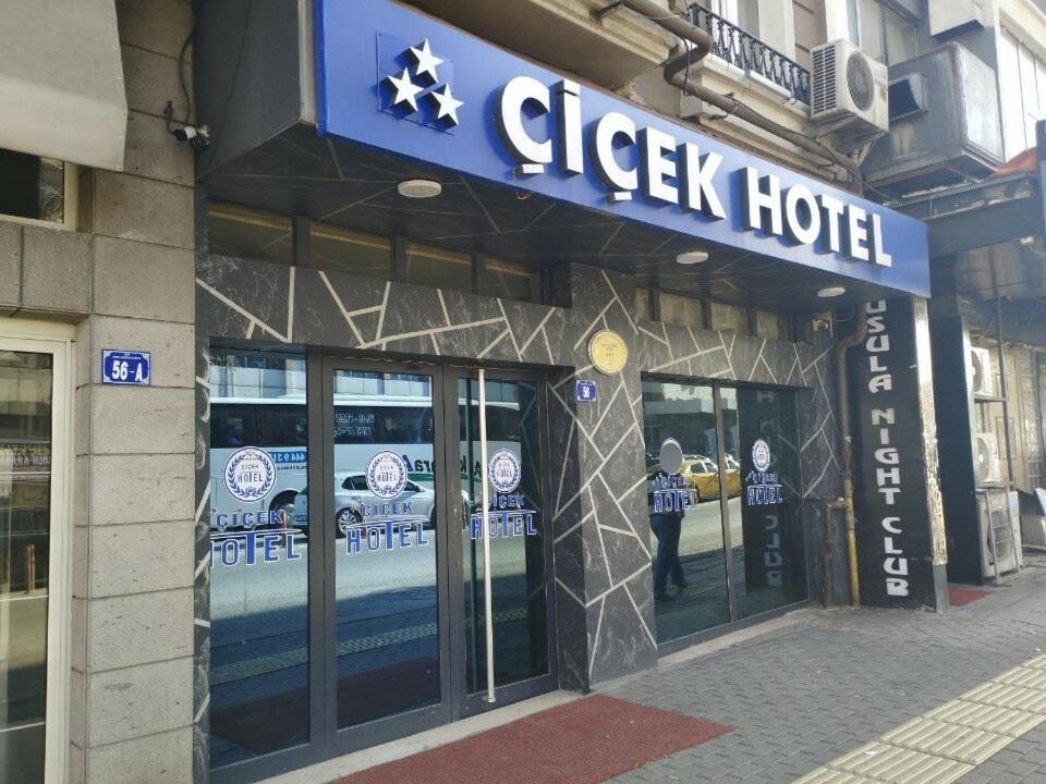 a greek hotel sign on the front of a building at Çiçek Hotel in Ankara