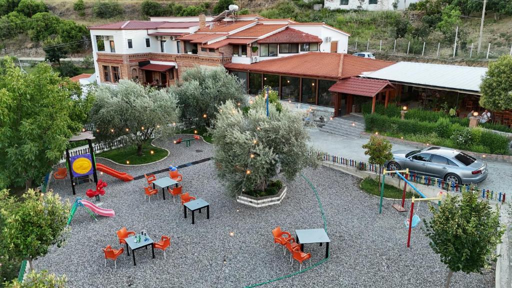 an aerial view of a park with a playground at Salillari Guest house & Restaurant in Berat