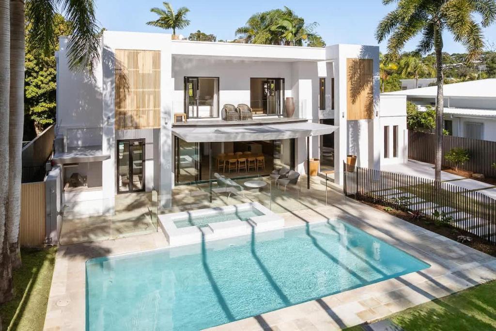 an image of a house with a swimming pool at Casa Six on Witta in Noosa Heads