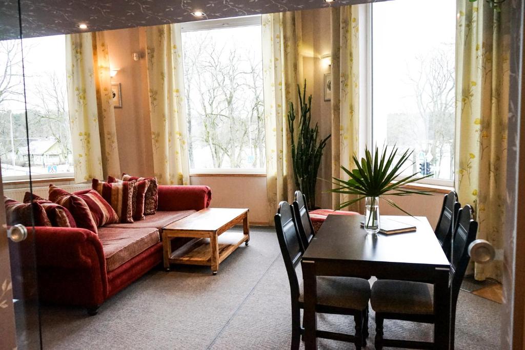 Posezení v ubytování Guest House Senasis Pastas