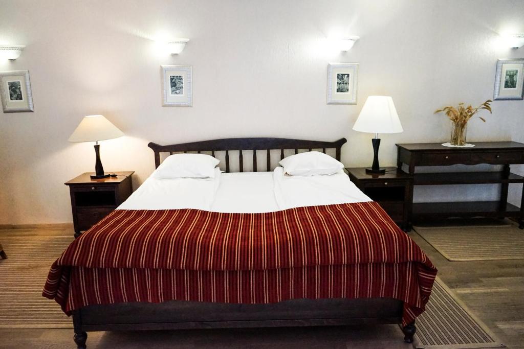 Postel nebo postele na pokoji v ubytování Guest House Senasis Pastas