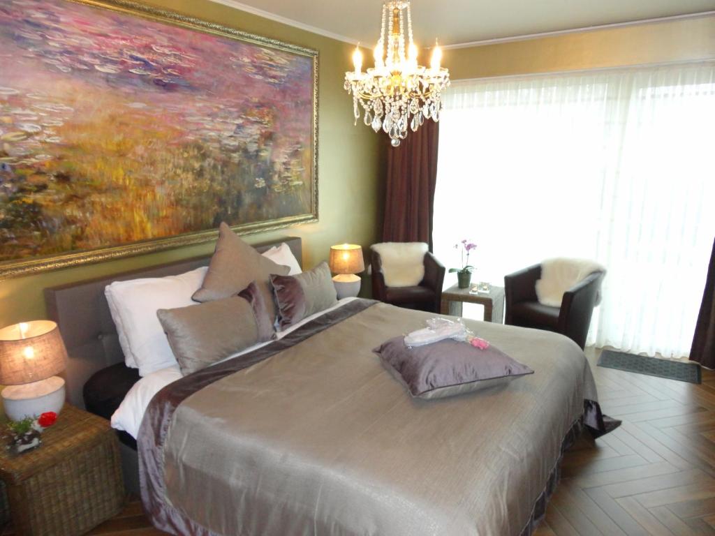 Letto o letti in una camera di Art Of Dreams Deluxe 4 stars