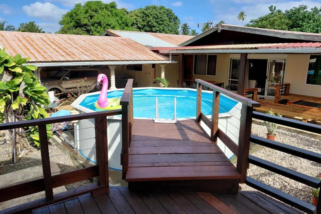 a deck with a plunge pool in a house at Spacious Family House with Pool in Afareaitu