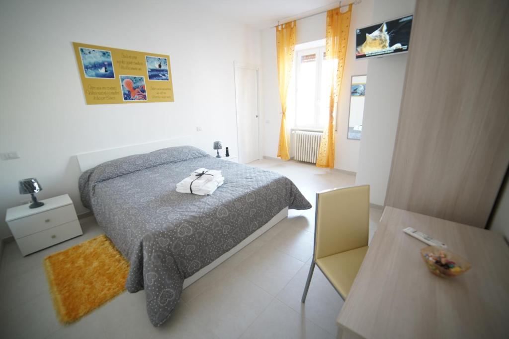 Postel nebo postele na pokoji v ubytování La Casa dei Sogni