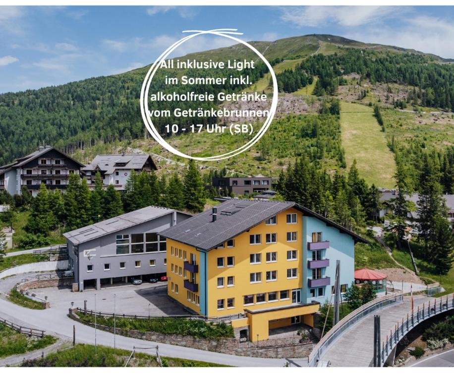 an overhead view of a building in a mountain at Basekamp Mountain Budget Hotel in Katschberghöhe