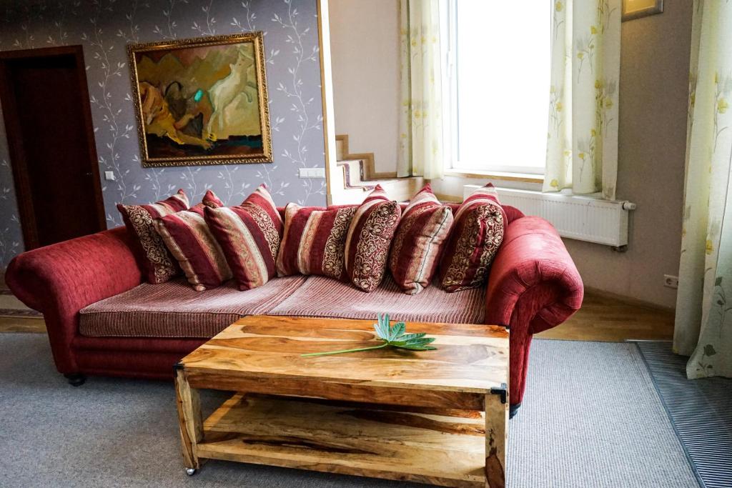 Posezení v ubytování Guest House Senasis Pastas