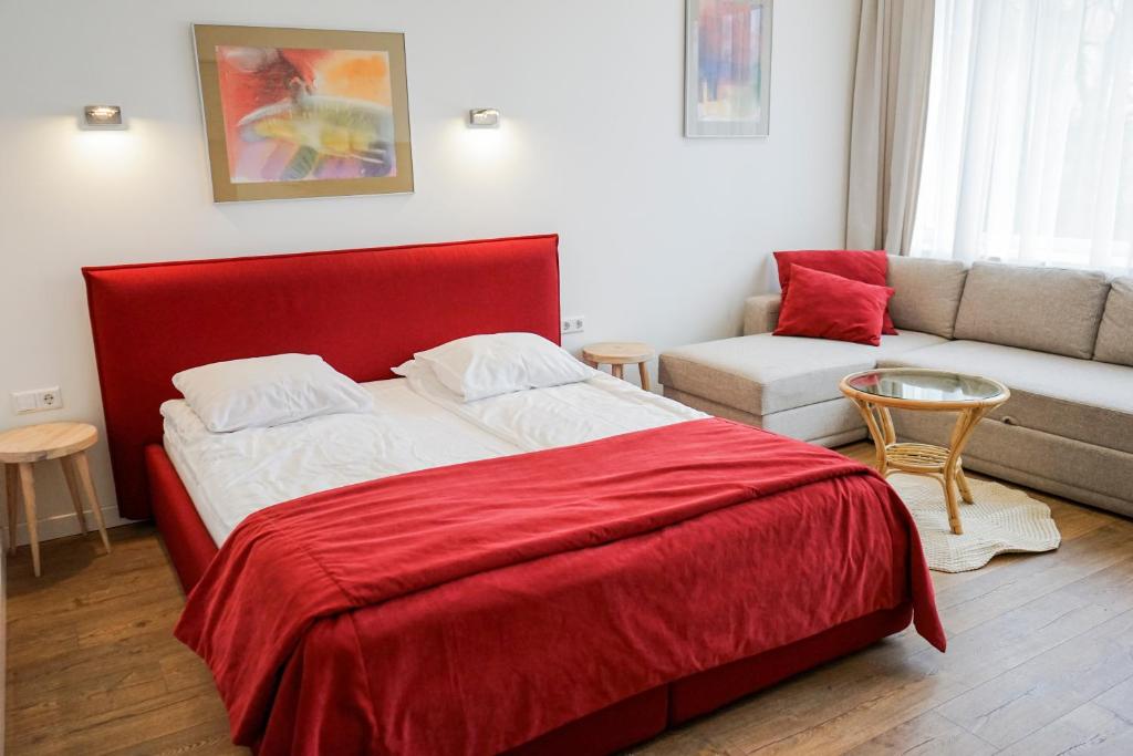 Postel nebo postele na pokoji v ubytování Guest House Senasis Pastas