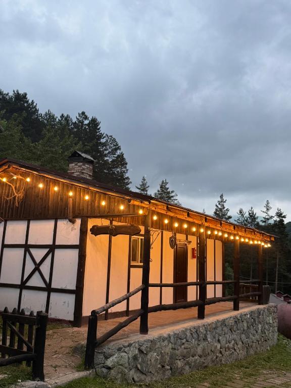 a building with a lot of lights on it at Zartak cottage in Dilijan