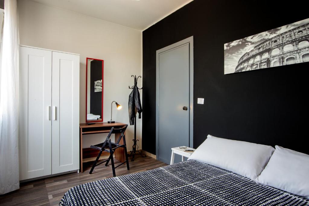 Postel nebo postele na pokoji v ubytování Radio Hotel