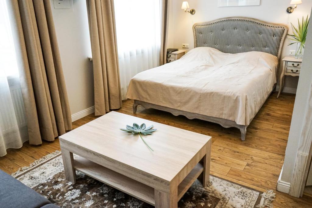 Postel nebo postele na pokoji v ubytování Guest House Senasis Pastas