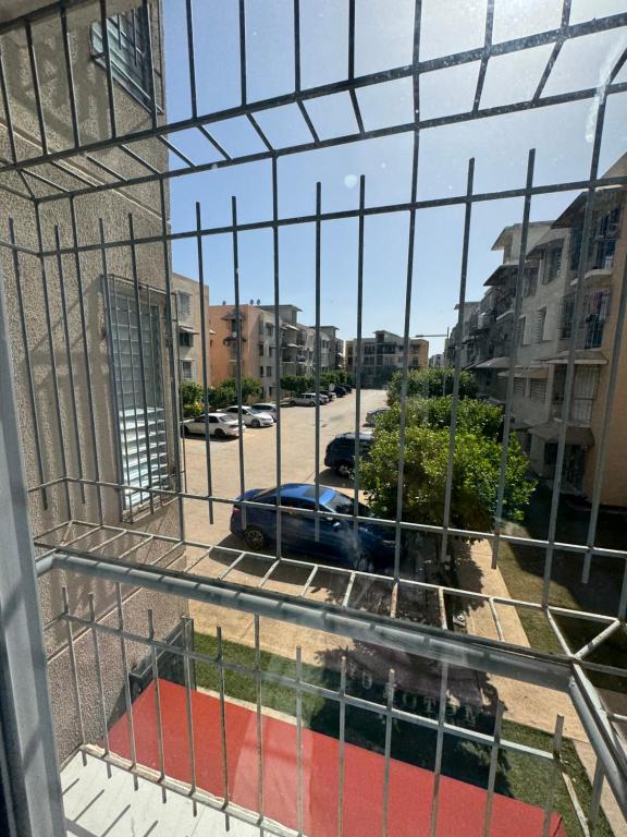 a view from a window of a street with a car at Palmera africana 1 in Los Paredones
