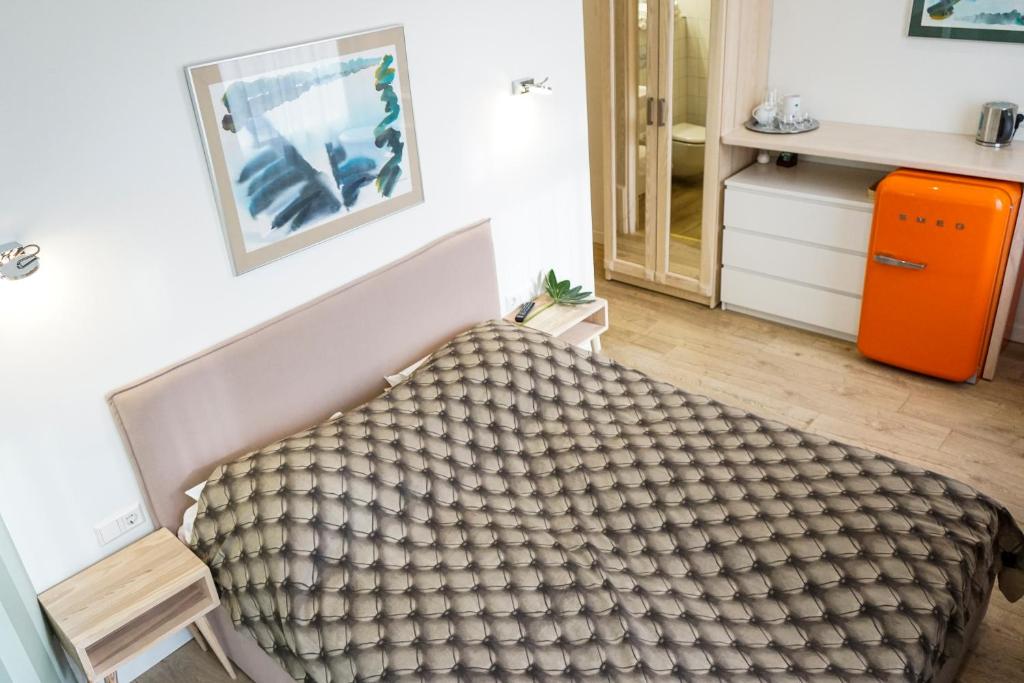 Postel nebo postele na pokoji v ubytování Guest House Senasis Pastas