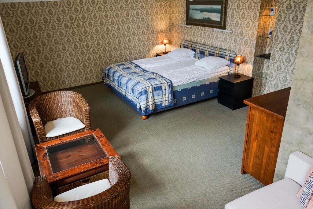 Postel nebo postele na pokoji v ubytování Guest House Senasis Pastas