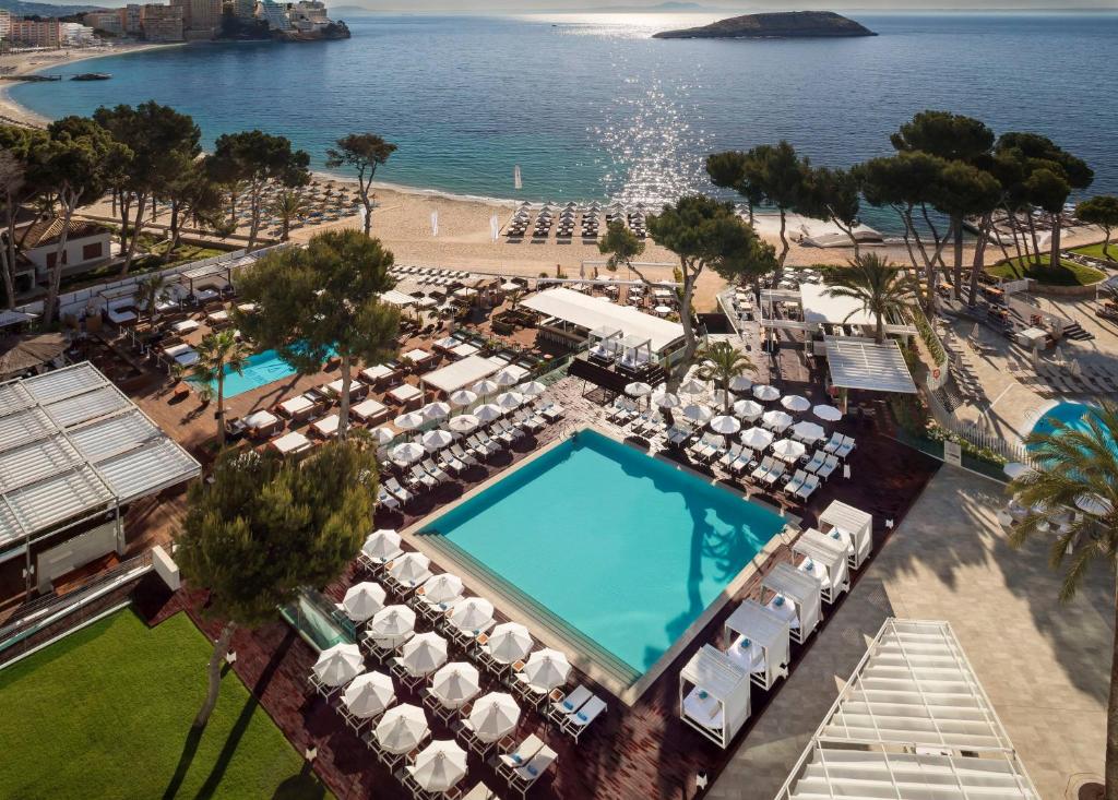 an aerial view of a resort with a swimming pool at Meliá South Beach in Magaluf