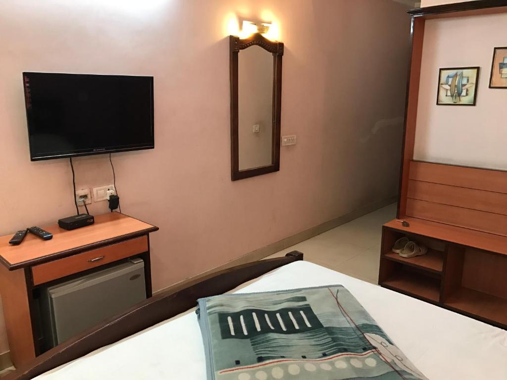 TV a/nebo společenská místnost v ubytování Hotel D R International