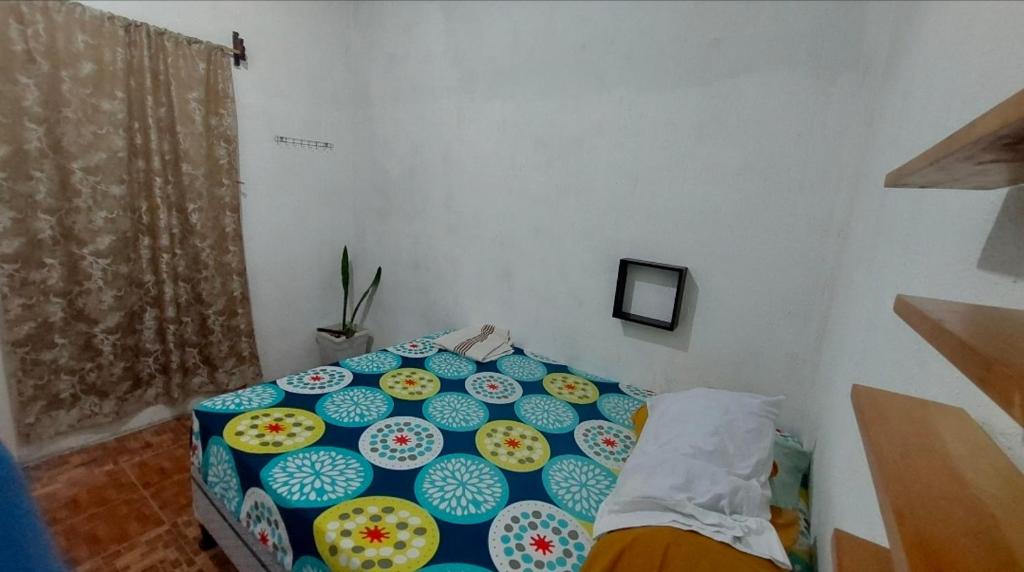 a room with a table with plates on it at Habitacion Amatitlan in Amatitlán