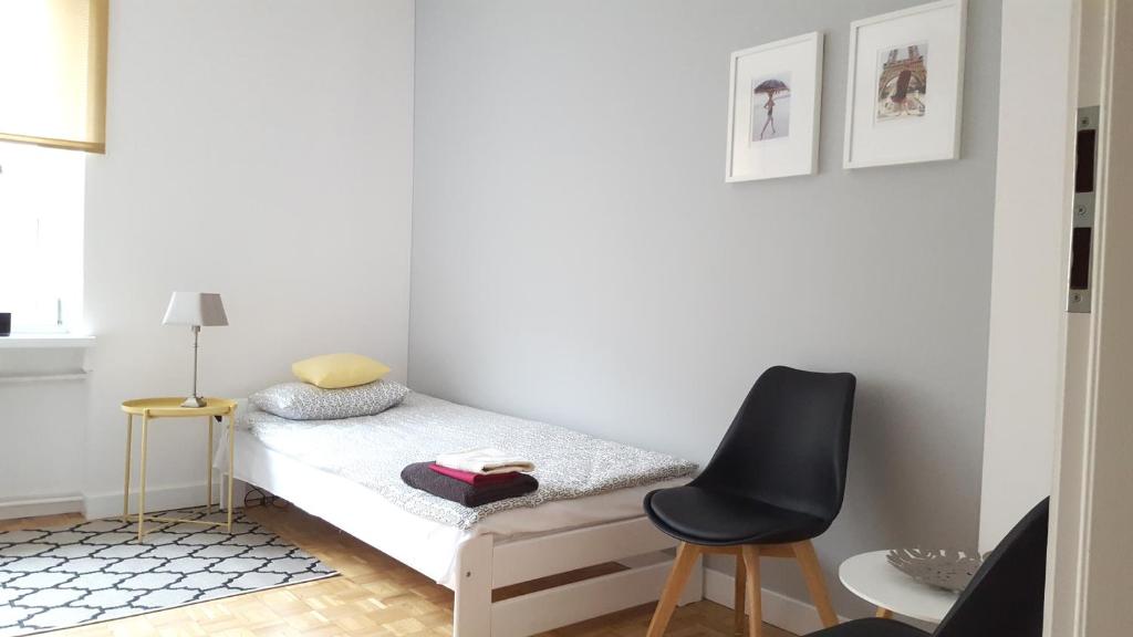 Posteľ alebo postele v izbe v ubytovaní Apartament Centrum Rynek