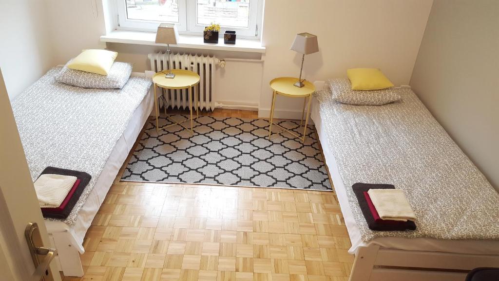 Posteľ alebo postele v izbe v ubytovaní Apartament Centrum Rynek