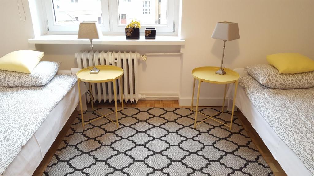 Posteľ alebo postele v izbe v ubytovaní Apartament Centrum Rynek