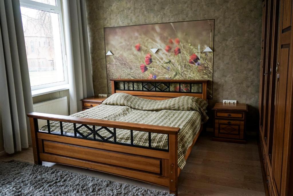 Postel nebo postele na pokoji v ubytování Guest House Senasis Pastas
