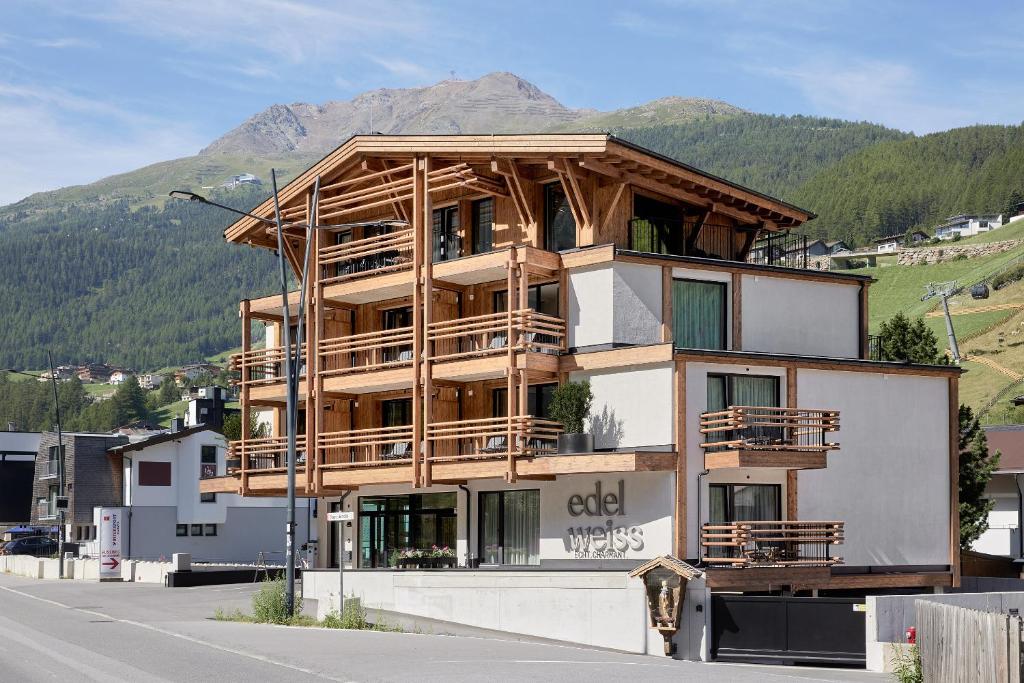 a building under construction on the side of a road at Edelweiss echt-charmant in Sölden