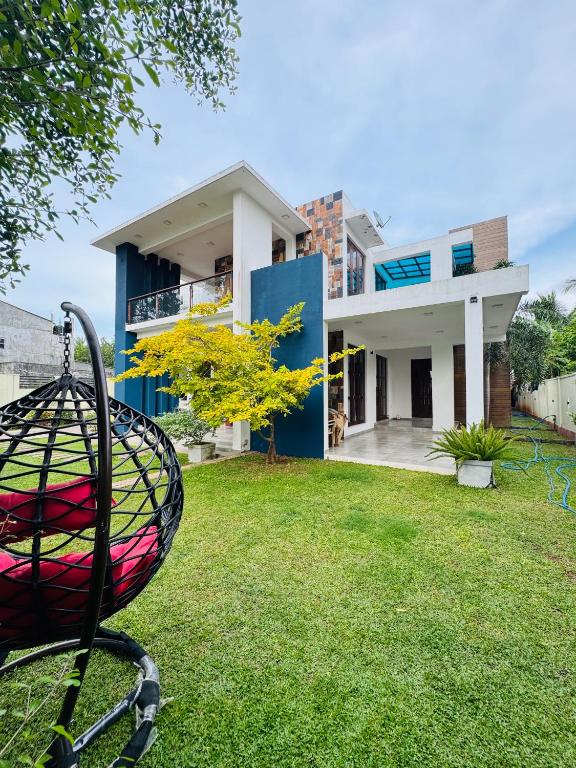 a view of a house from the yard at US Apartment in Nochchiyagama