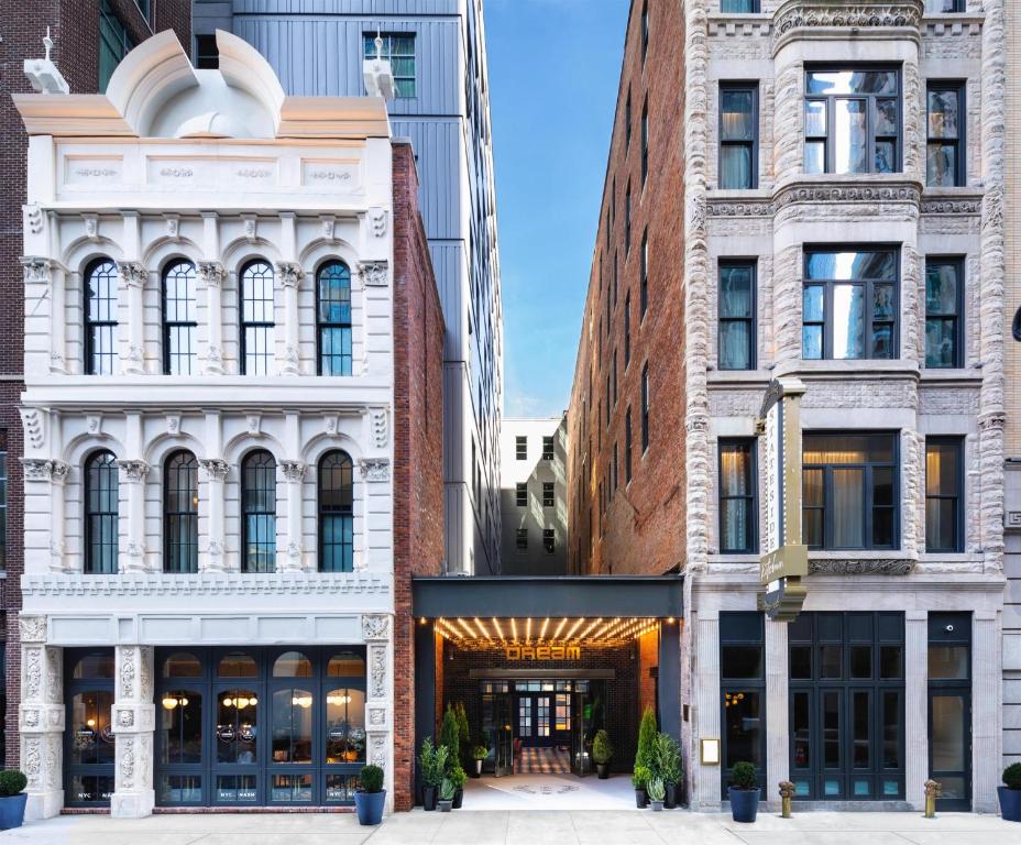 a group of buildings in a city at Dream Nashville, by Hyatt in Nashville