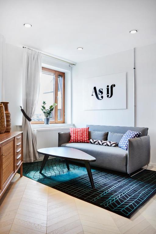 a living room with a couch and a coffee table at Generator Stockholm in Stockholm