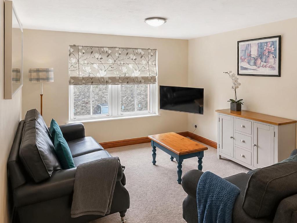 a living room with a couch and a coffee table at Howgills Apartment 9 - Ukc9724 in Sedbergh