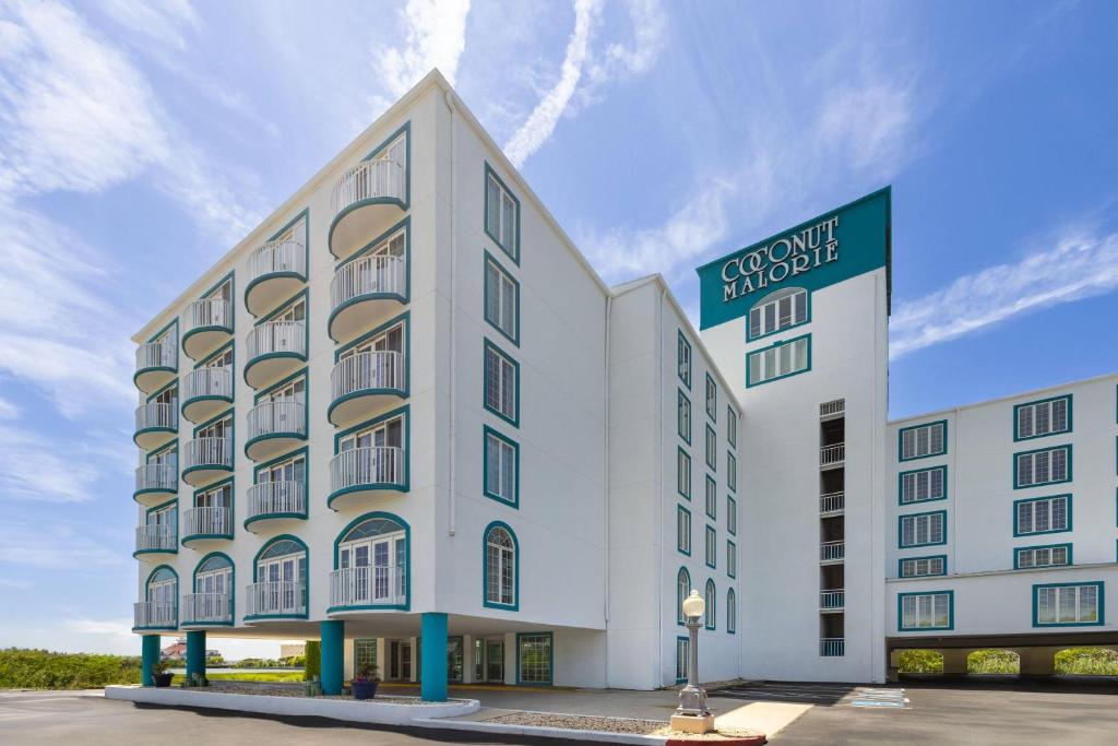 a rendering of the exterior of a hotel at Coconut Malorie Resort Ocean City, an Ascend Collection Hotel in Ocean City