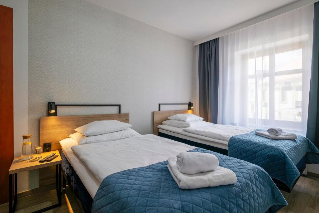 Apartamenty Pod Lwem - Twin Room