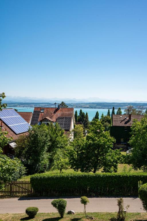 a view of a house with solar panels at Seeblick Apartment Meersburg in Meersburg