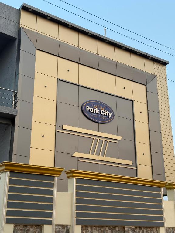 a patch city sign on the side of a building at PARK CITY HOTEL & Resort in Gangāyapalle