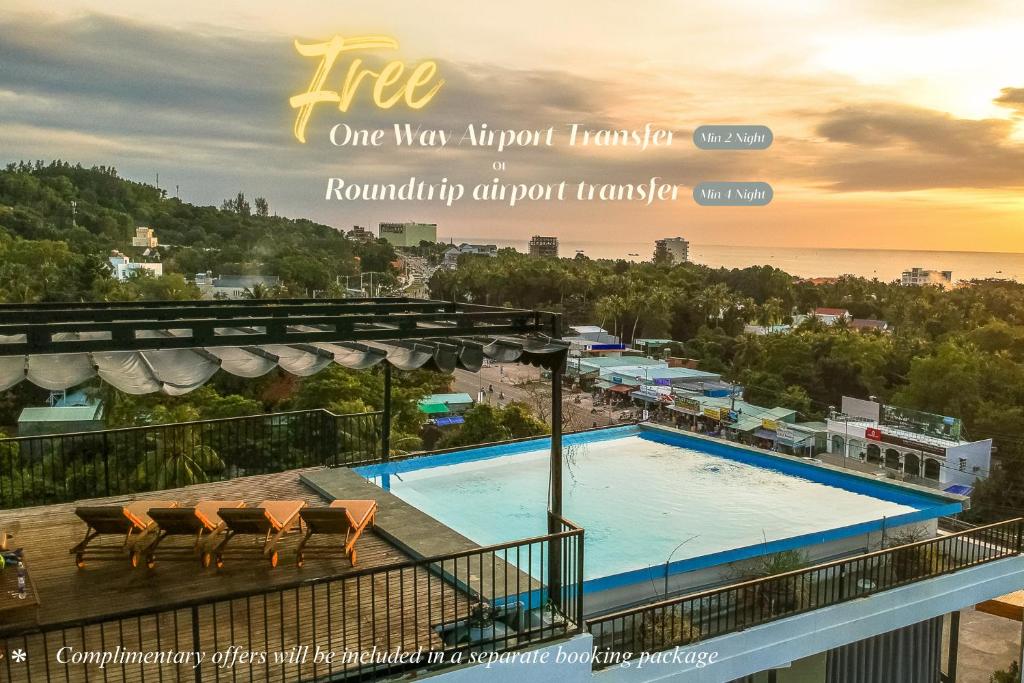a view of a swimming pool on top of a building at Golden Daisy Hotel Phu Quoc in Phú Quốc