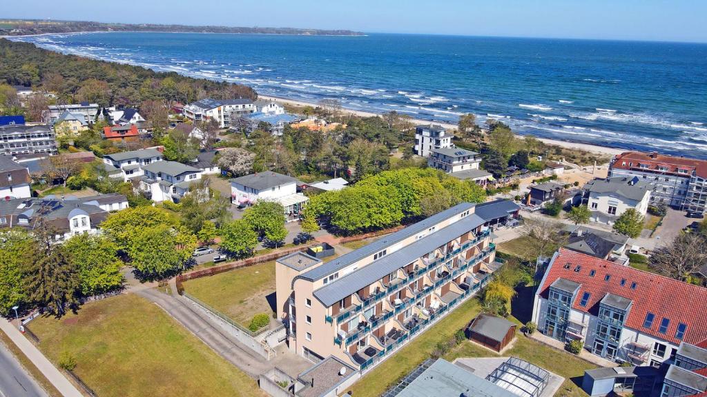 an aerial view of a city with the ocean at Bella Casa 42 - SternenMeer in Juliusruh