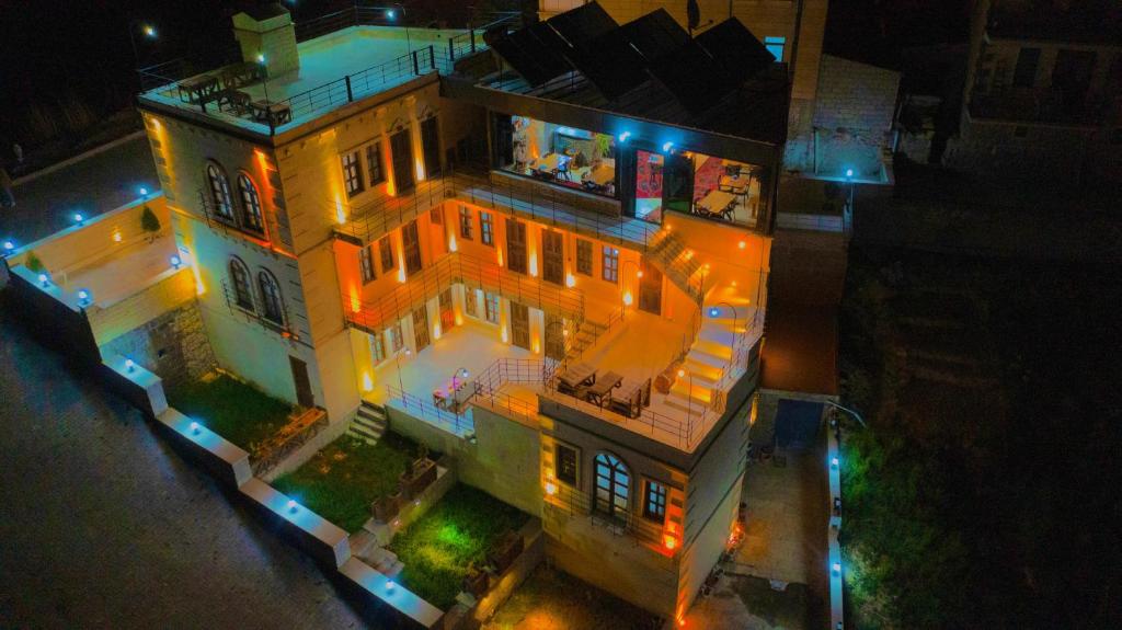 an aerial view of a house with lights on it at Gemosa Cappadocia Hotel in Ürgüp