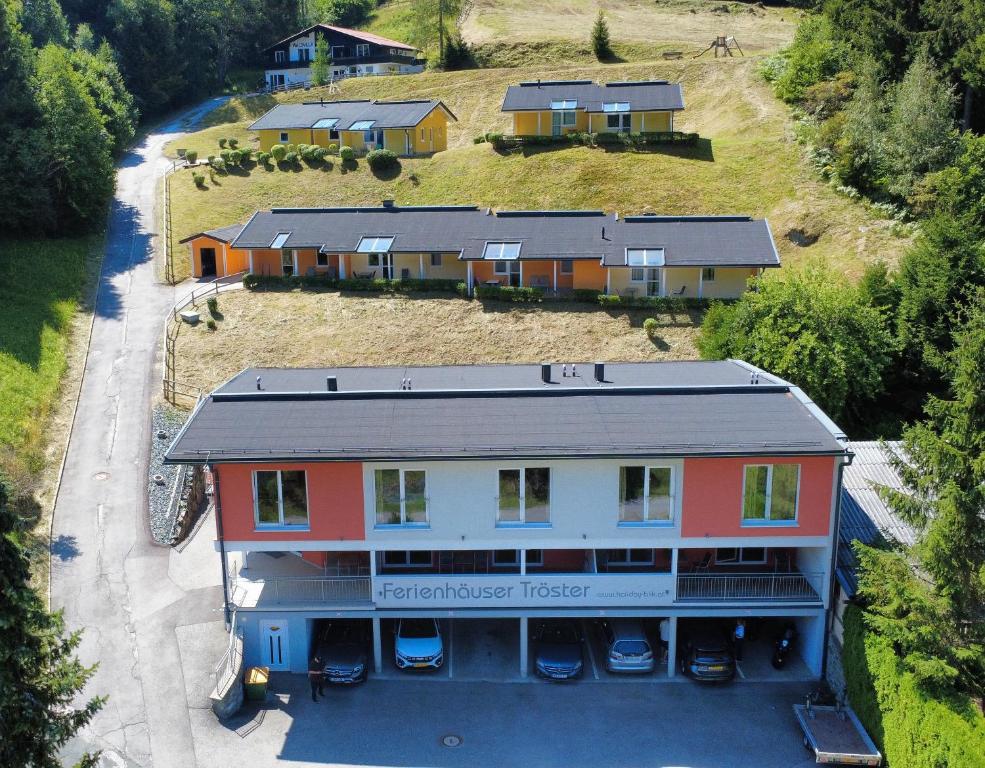 an aerial view of a house with a yard at Ferienhäuser Tröster in Bad Kleinkirchheim