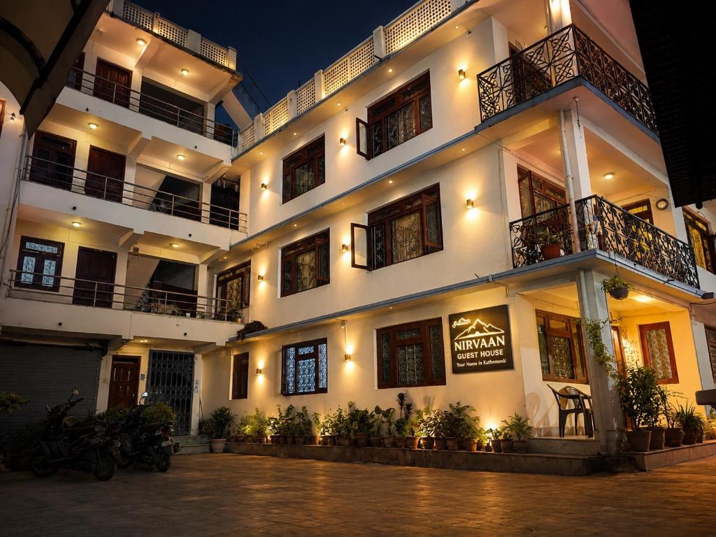 a large white building with a lot of windows at Nirvaan Guest House since 2019 in Kathmandu