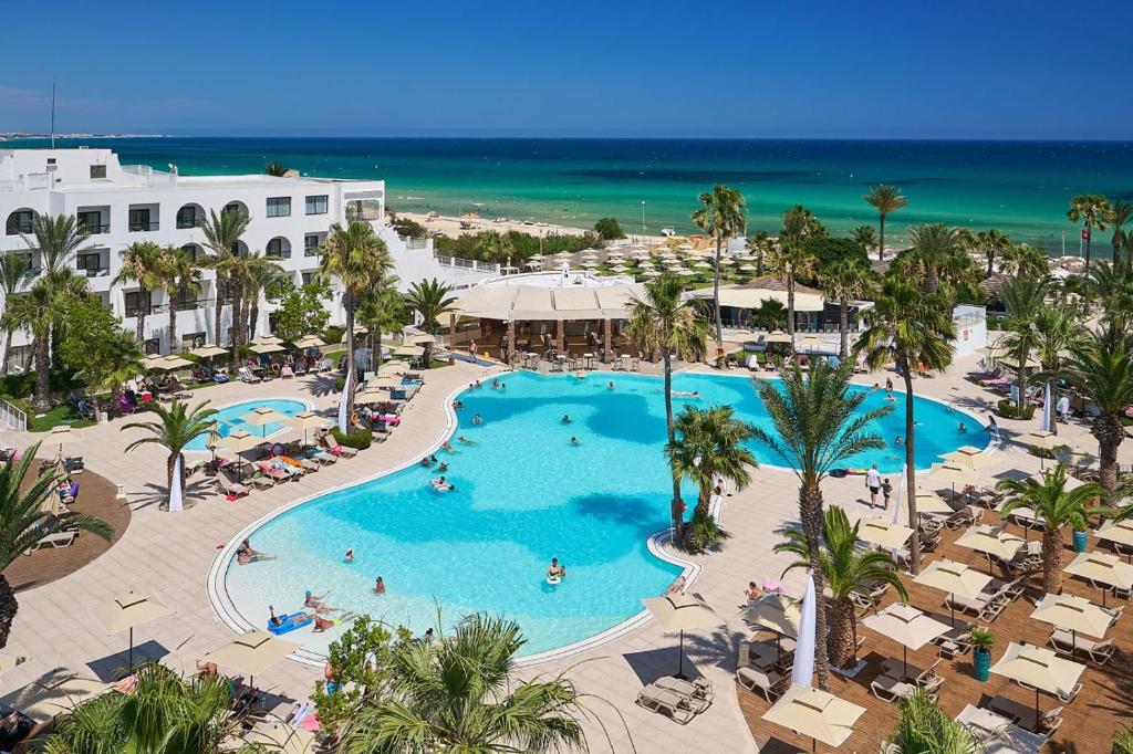 an overhead view of a swimming pool at a resort at Nozha Beach Resort & Spa in Hammamet