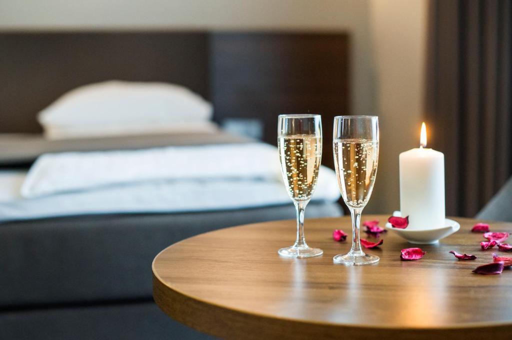 Postel nebo postele na pokoji v ubytování Hotel Porto