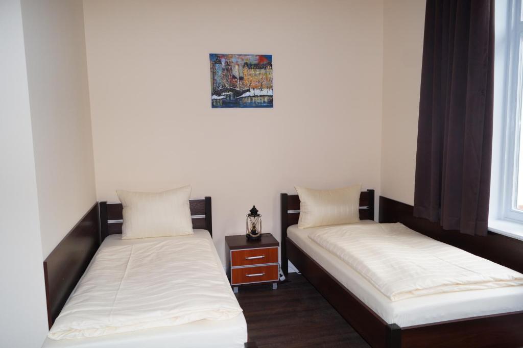 Postel nebo postele na pokoji v ubytování MY-BED Hamburg