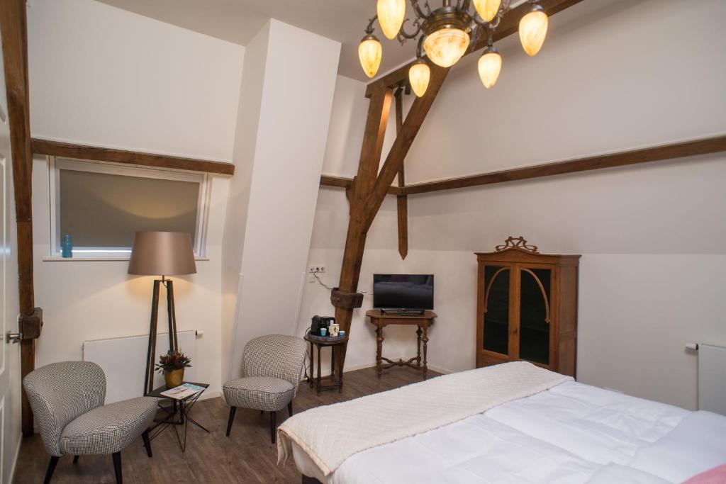 Boutique Hotel De Blauwe Pauw - Resim 39
