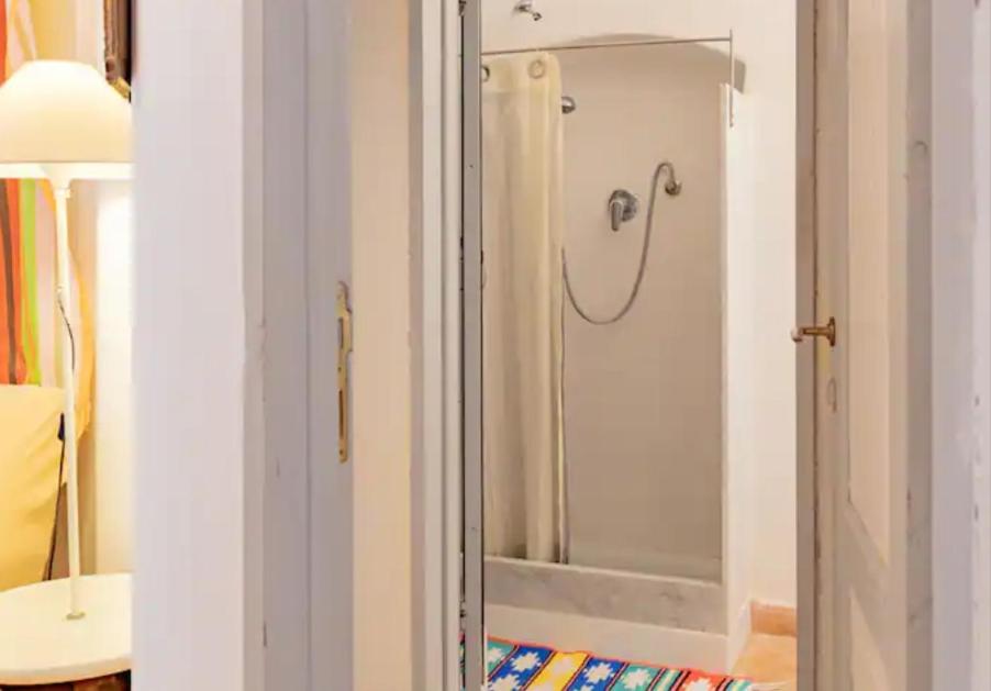 a shower in a bathroom with a glass door at Authentic and Charming apartments between Cinque Terre and Portofino - Velva House in Velva