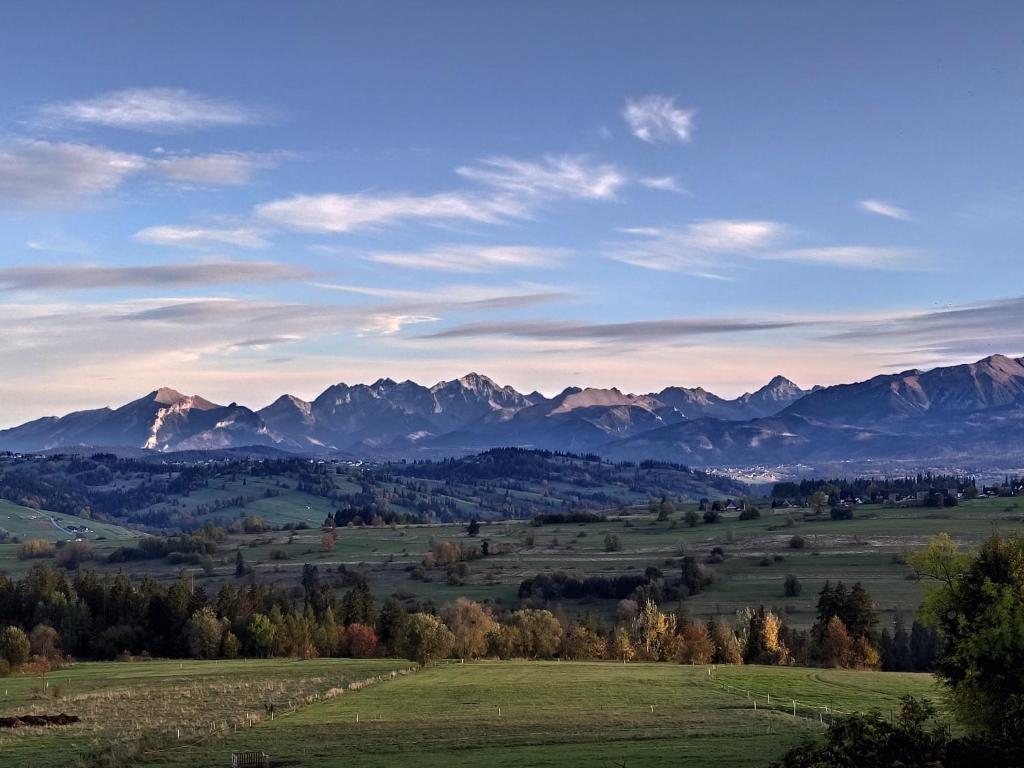 a view of a valley with mountains in the background at Kitajówka in Bańska Wyżna